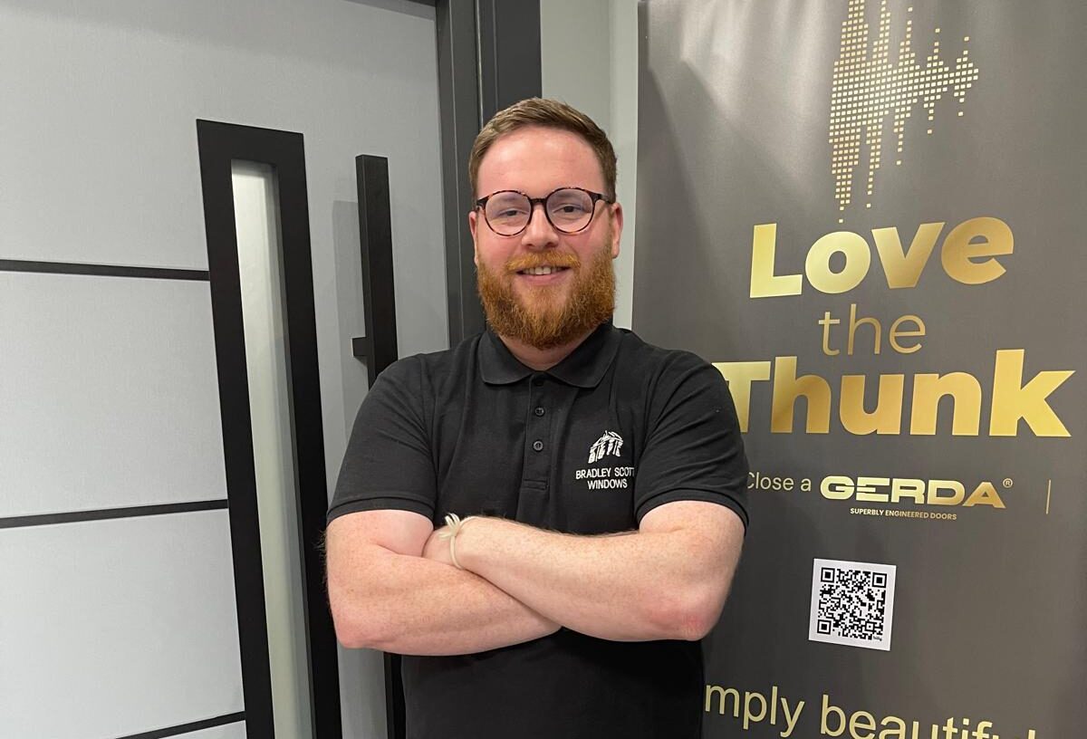 Bradley Scott Windows - Ashley Kitchen (office manager) in front of the Gerda door