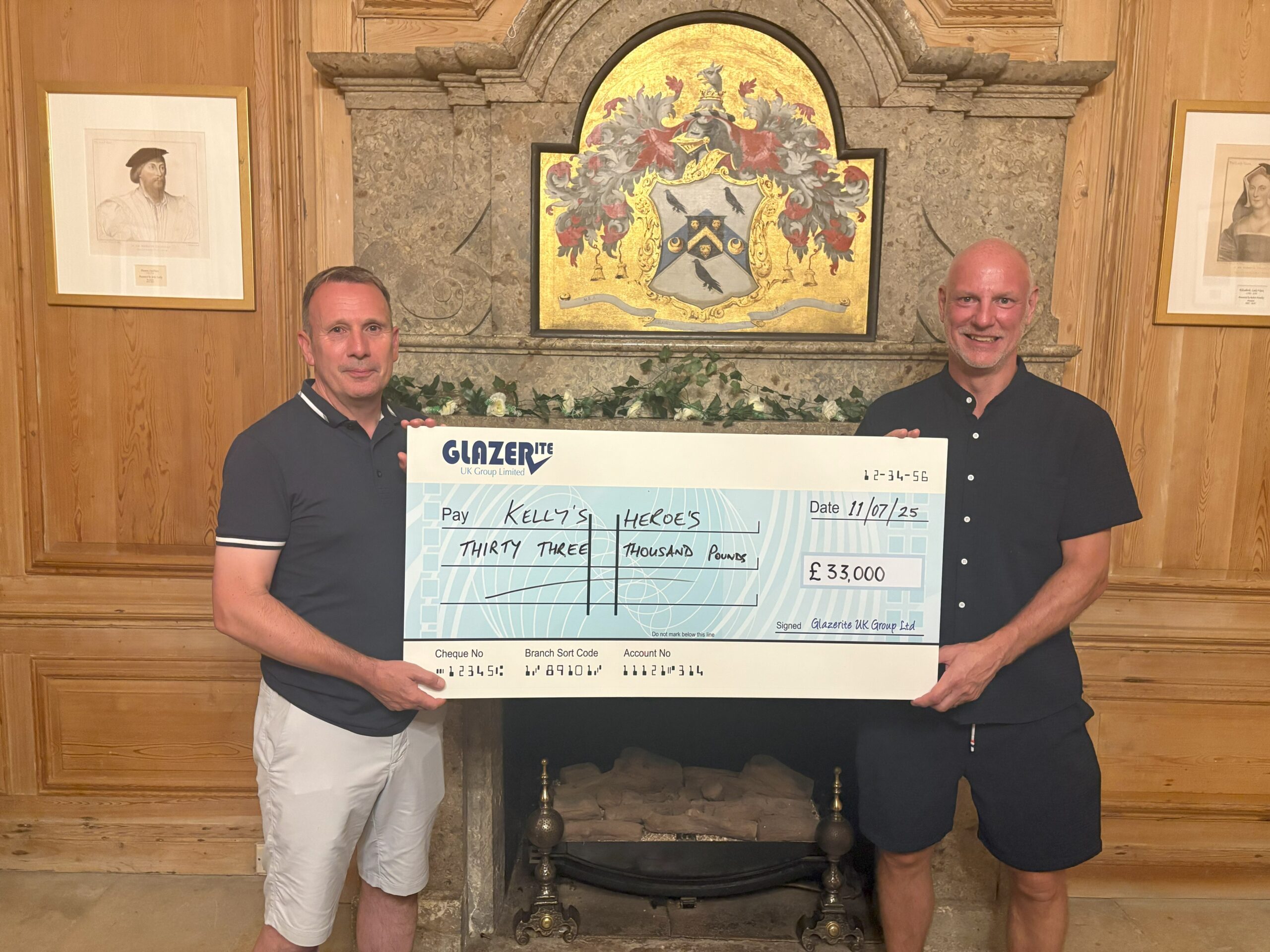 Jeff Dunn of Glazerite with John Hewitt of Kellys Heroes at the annual charity golf day