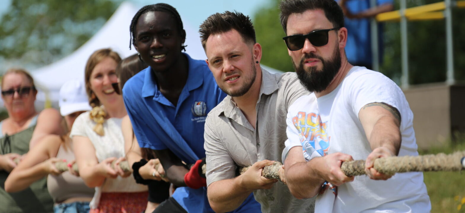 A mixed tug of war team led by Adam Thompson MP 2026